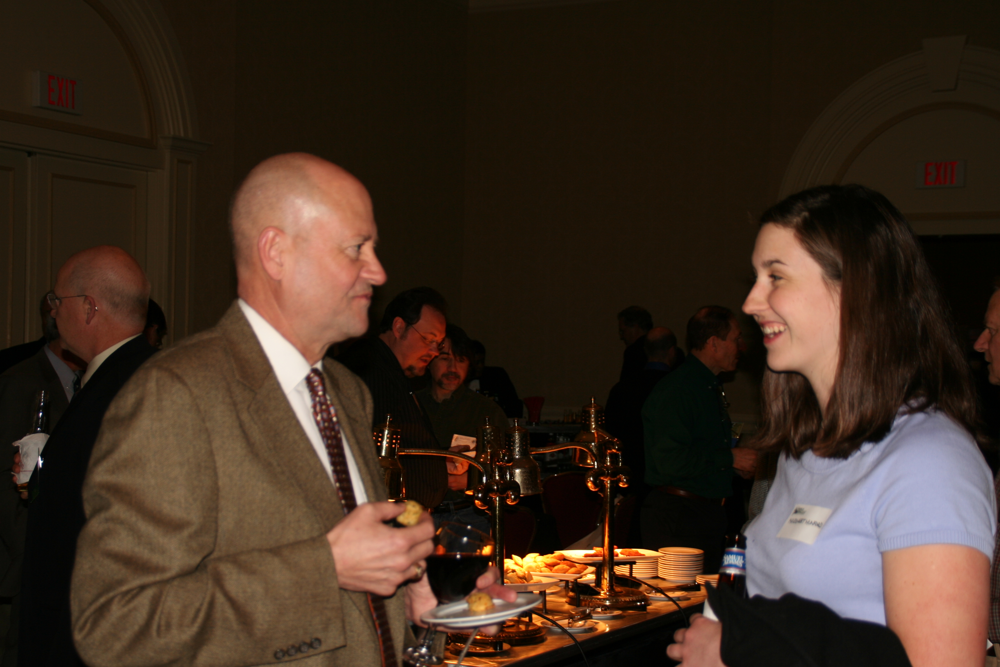 Our former Regional Forester Chuck Meyers greets Margaret Munford of the American Forest Foundation